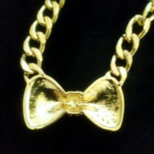 Load image into Gallery viewer, Red &amp; Clear Rhinestone Bow Gold Tone Necklace